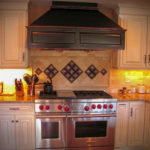 Chefs Kitchen With Custom Backsplash