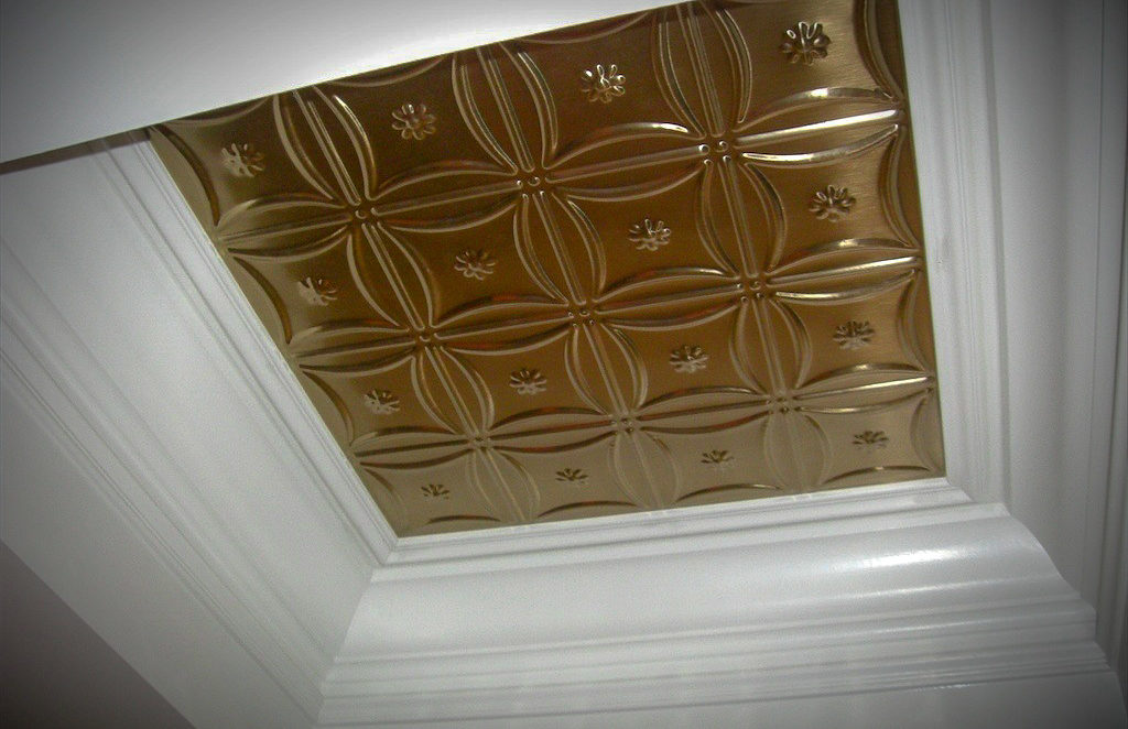 Tin ceiling panels in coffered space